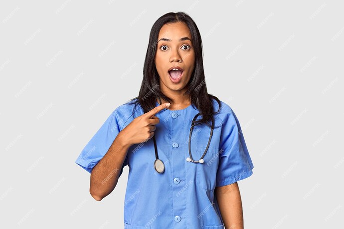 young-filipina-nurse-posed-studio-pointing-side_1187-409722-4061988474